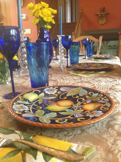 Bold blue glassware accents the table